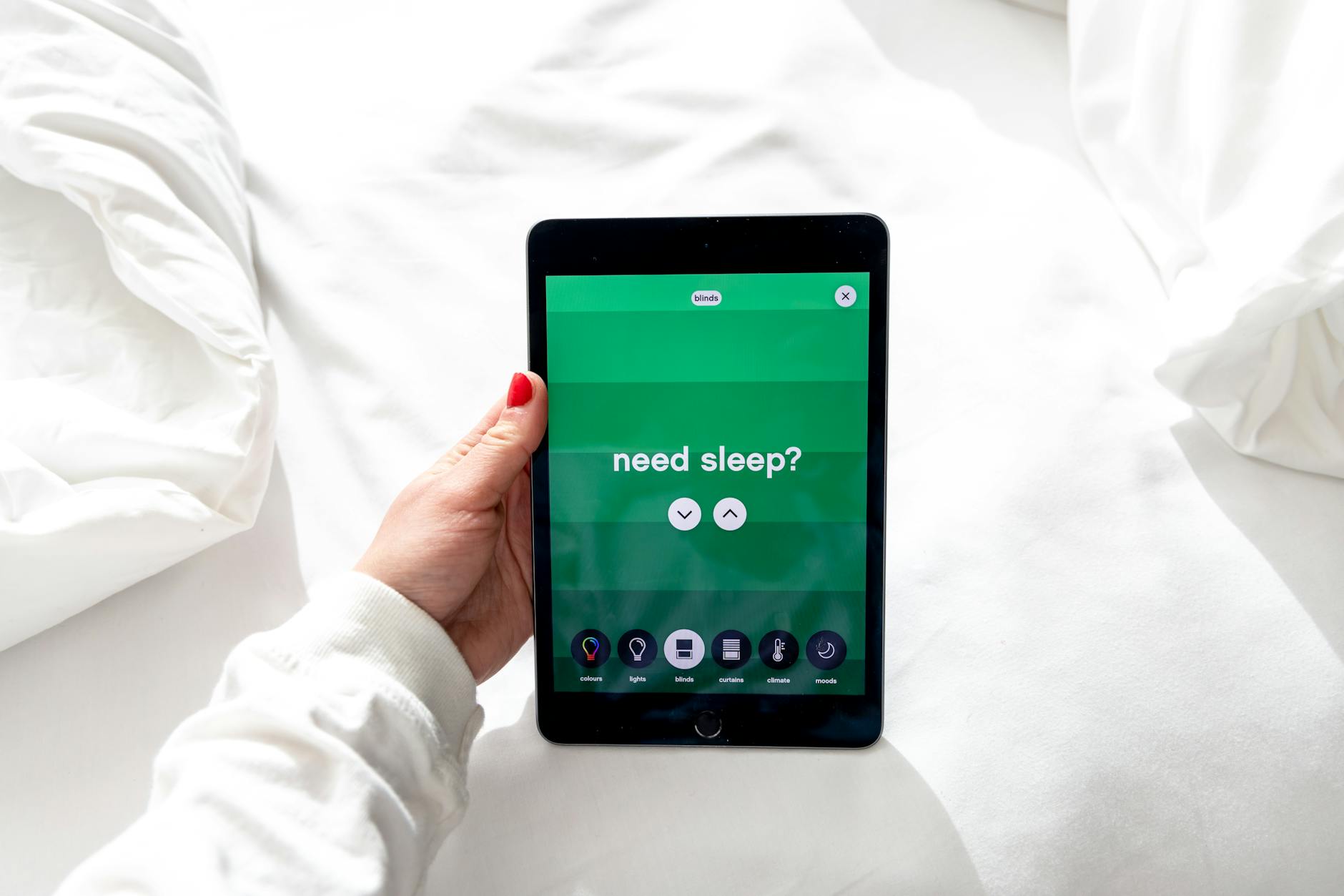 a person holding a digital tablet