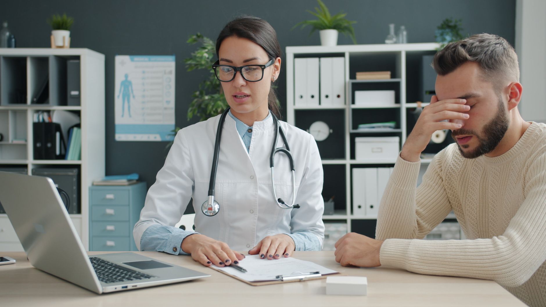 doctor consulting patient in modern office setting